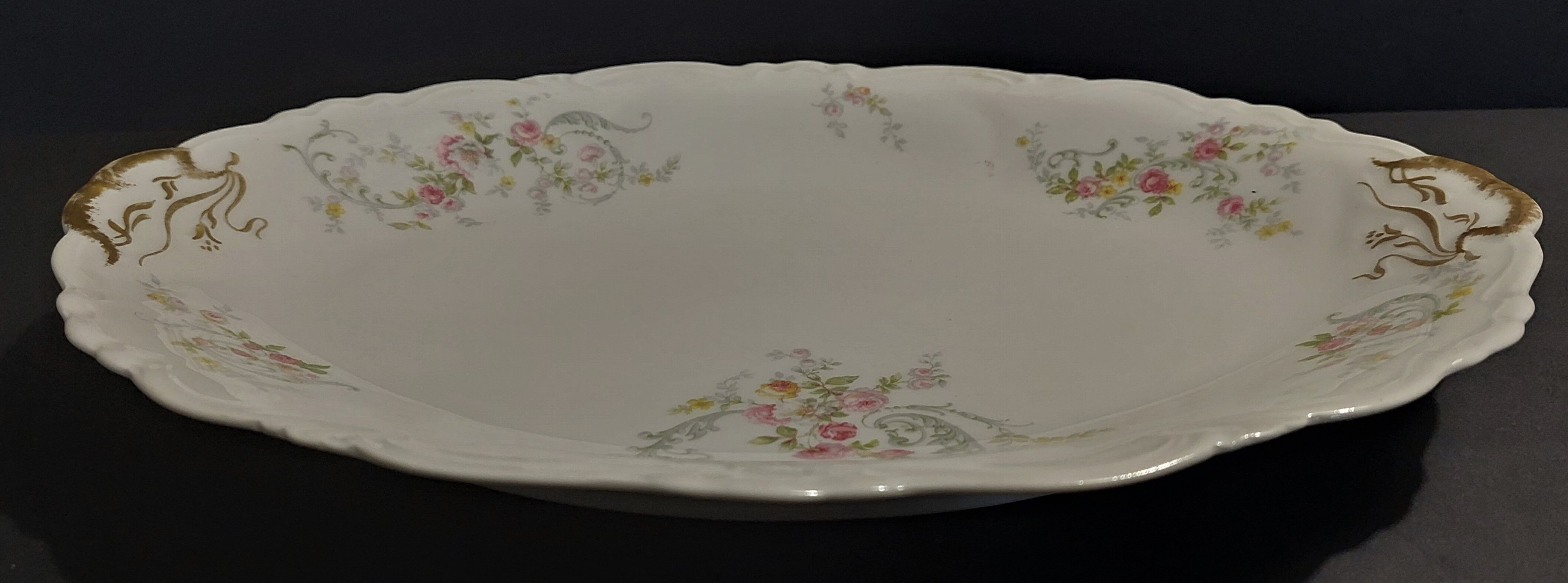 Oval serving dish in porcelain floral decoration Charles Arhenfeldt Limoges