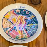 Flat colored porcelain plate, day of the week