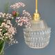 Suspension globe vintage en verre moulé transparent
