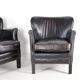 Pair of small leather club armchairs