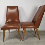 8 brown skai chairs 1950