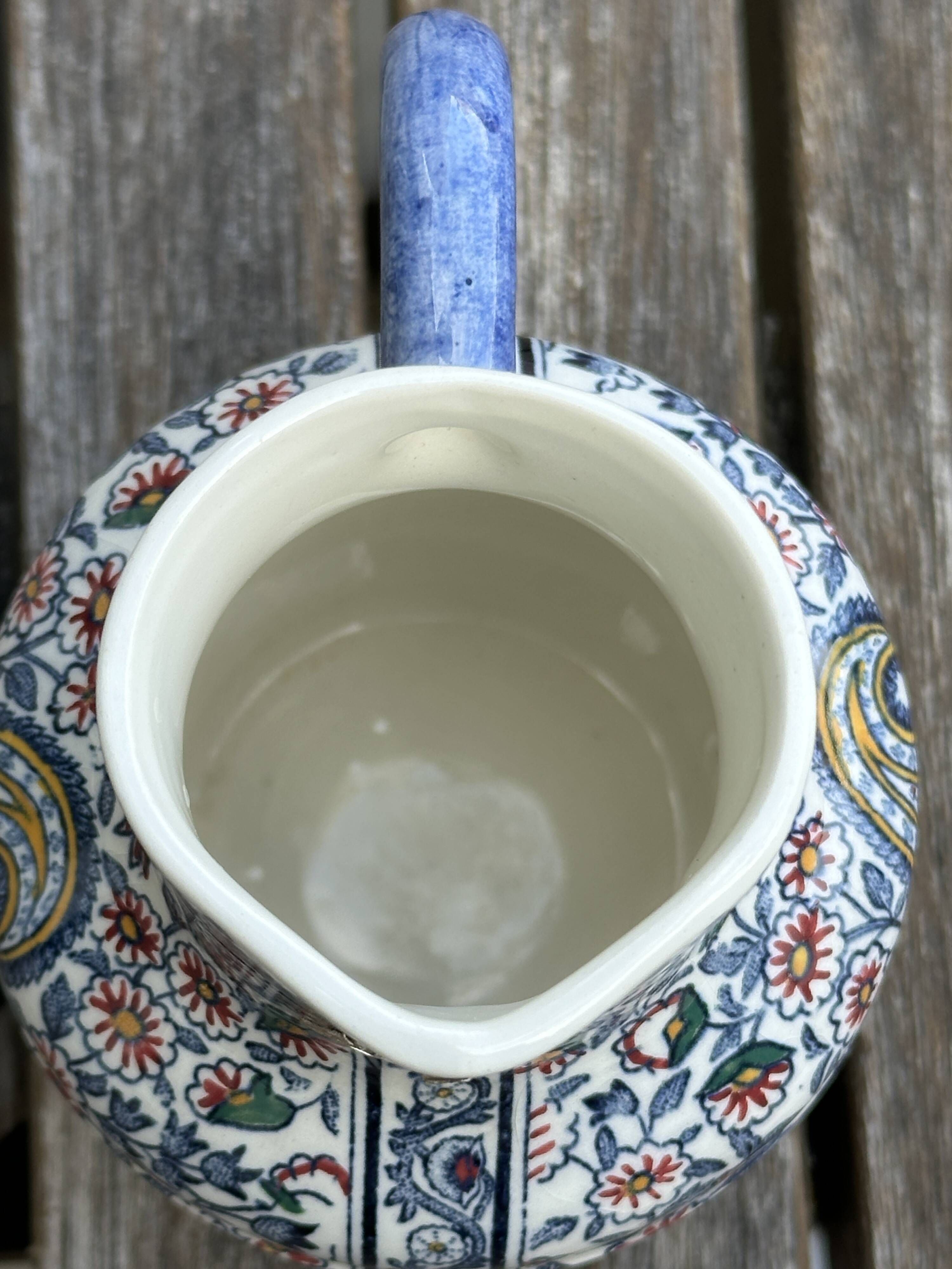 Antique pitcher / milk jug / vase in Gien earthenware with a Kashmir pattern.