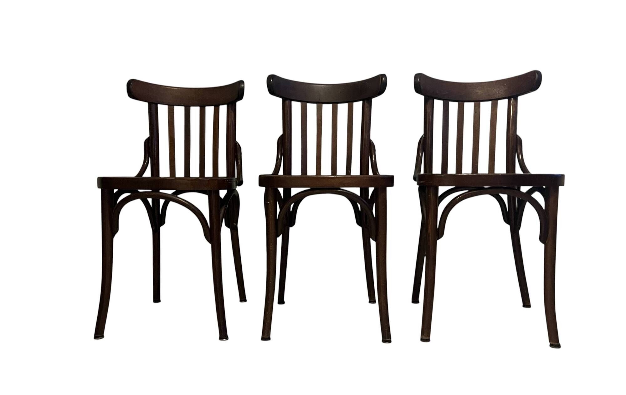Set of 3 vintage wooden bistro chairs from around 1950.