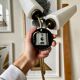 Black and gold metal wall and white opalines sconce