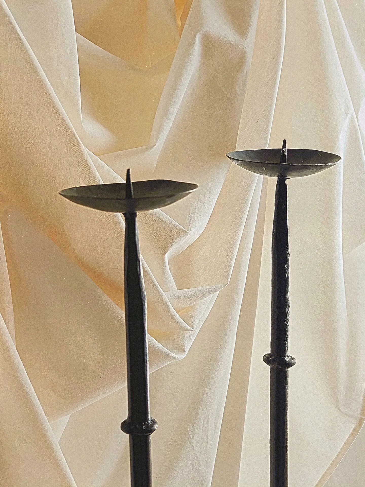 Pair of black cast iron floor candlesticks (candle holders)