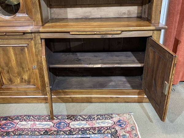 Bibliothèque en noyer et chêne début XXème avec son horloge centrale