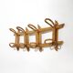 Wall coat rack in rattan and woven wicker, 1960s.