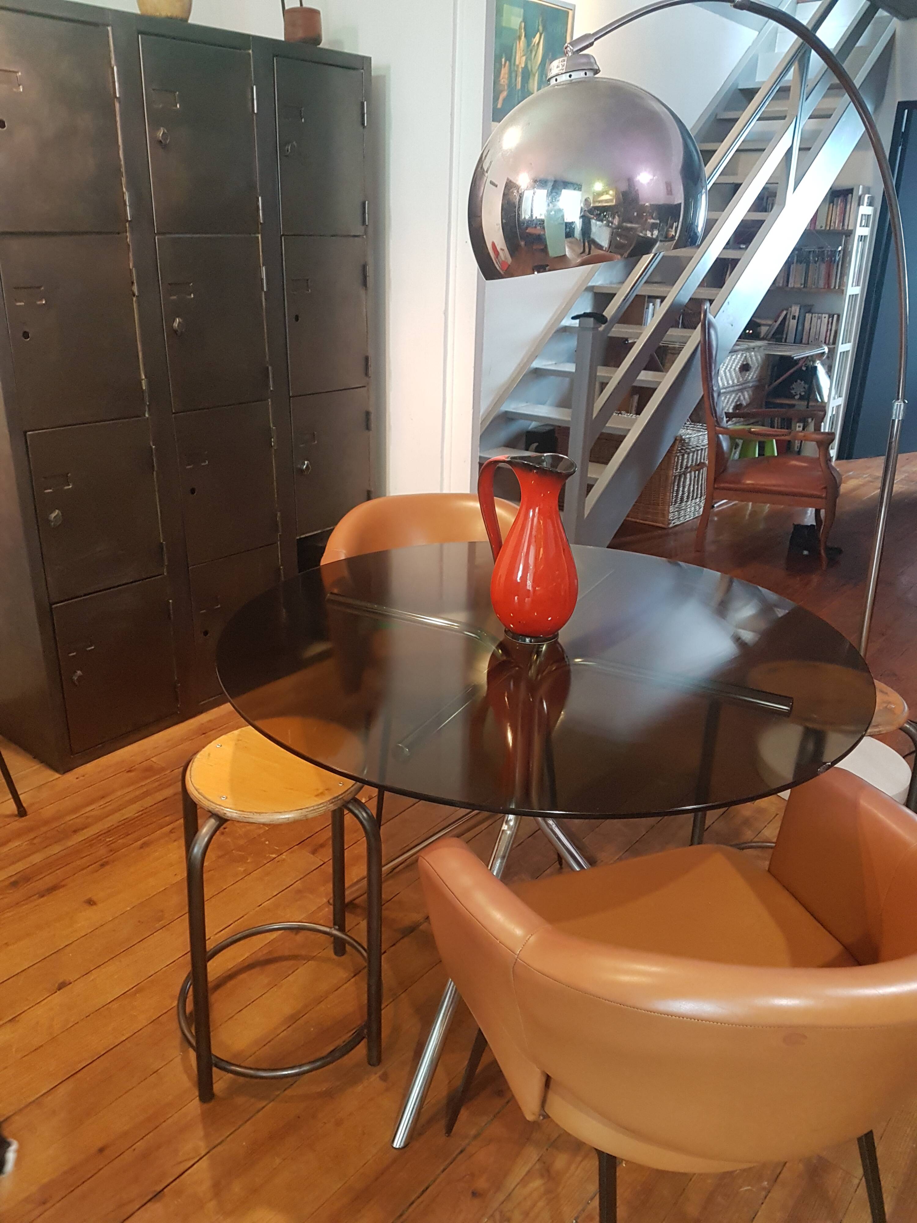 Smoked glass round table and chrome foot