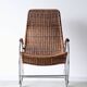 Vintage Thonet rocking chair in chrome and rattan, 1970.