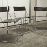 Set of 3 minimalist X line chairs by Niels Jorgen Haugesen.
