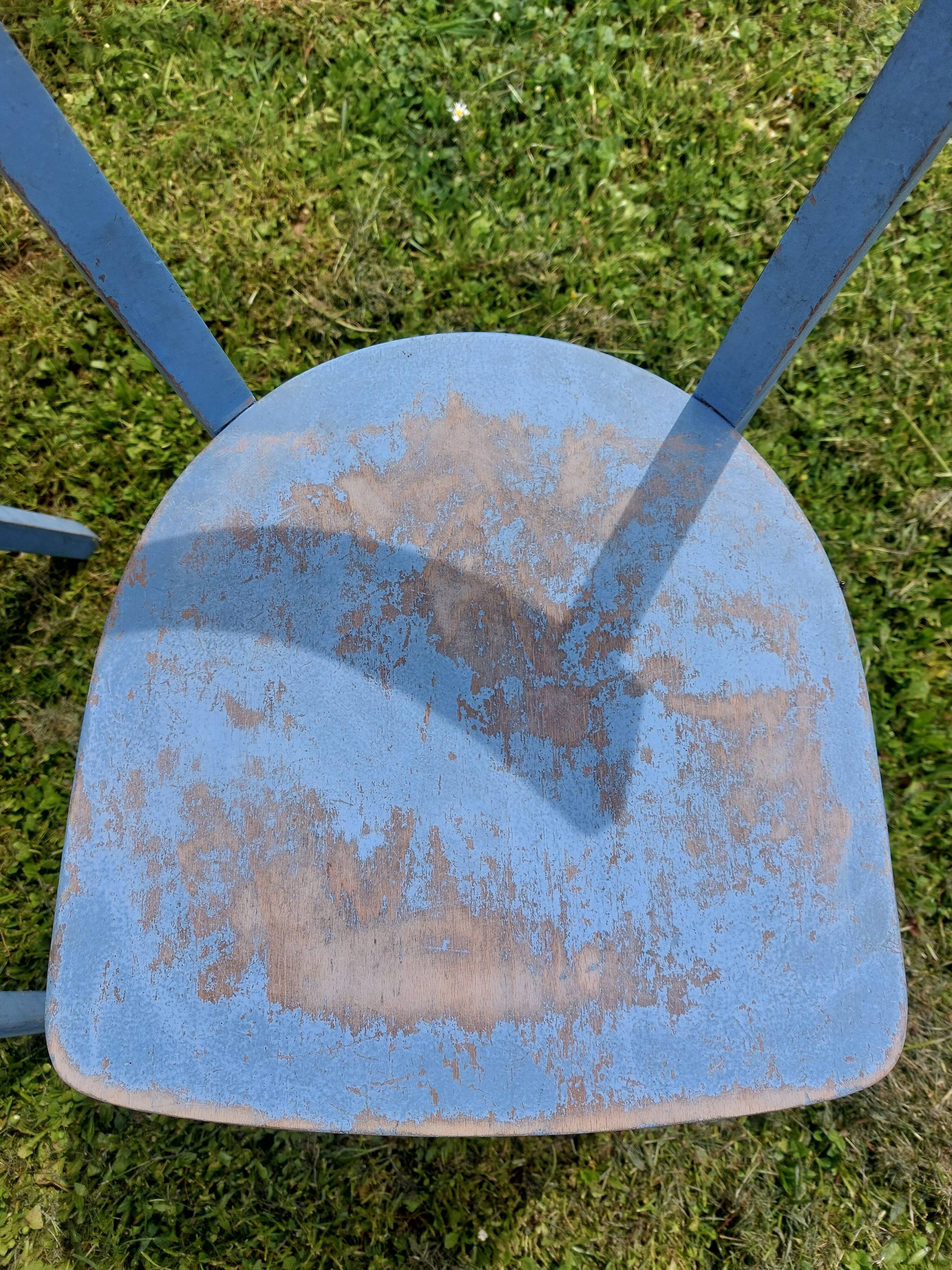 pair of chippy blue paint bistro chairs