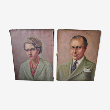 Pair of early twentieth Laurent Delhief oil portraits