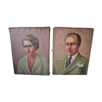 Pair of early twentieth Laurent Delhief oil portraits