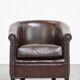 dark cowhide club chair in English style
