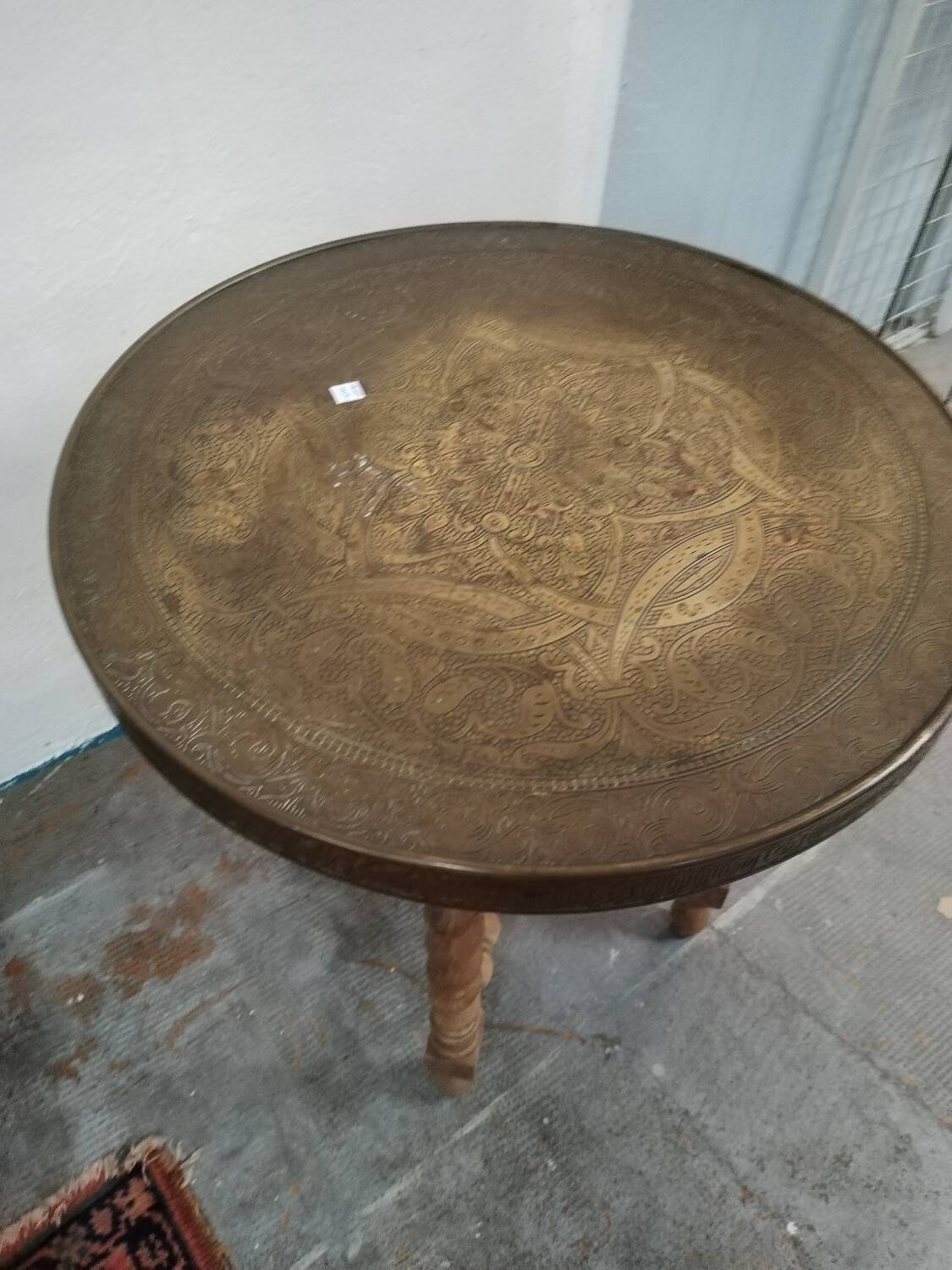Brass side table with turned legs