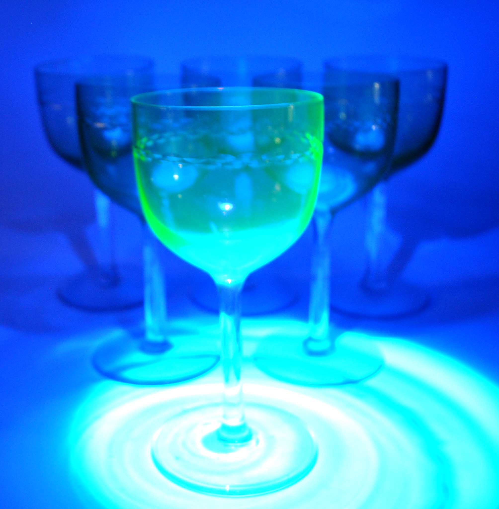 Series of 6 foot glasses in ancient green uranium glass