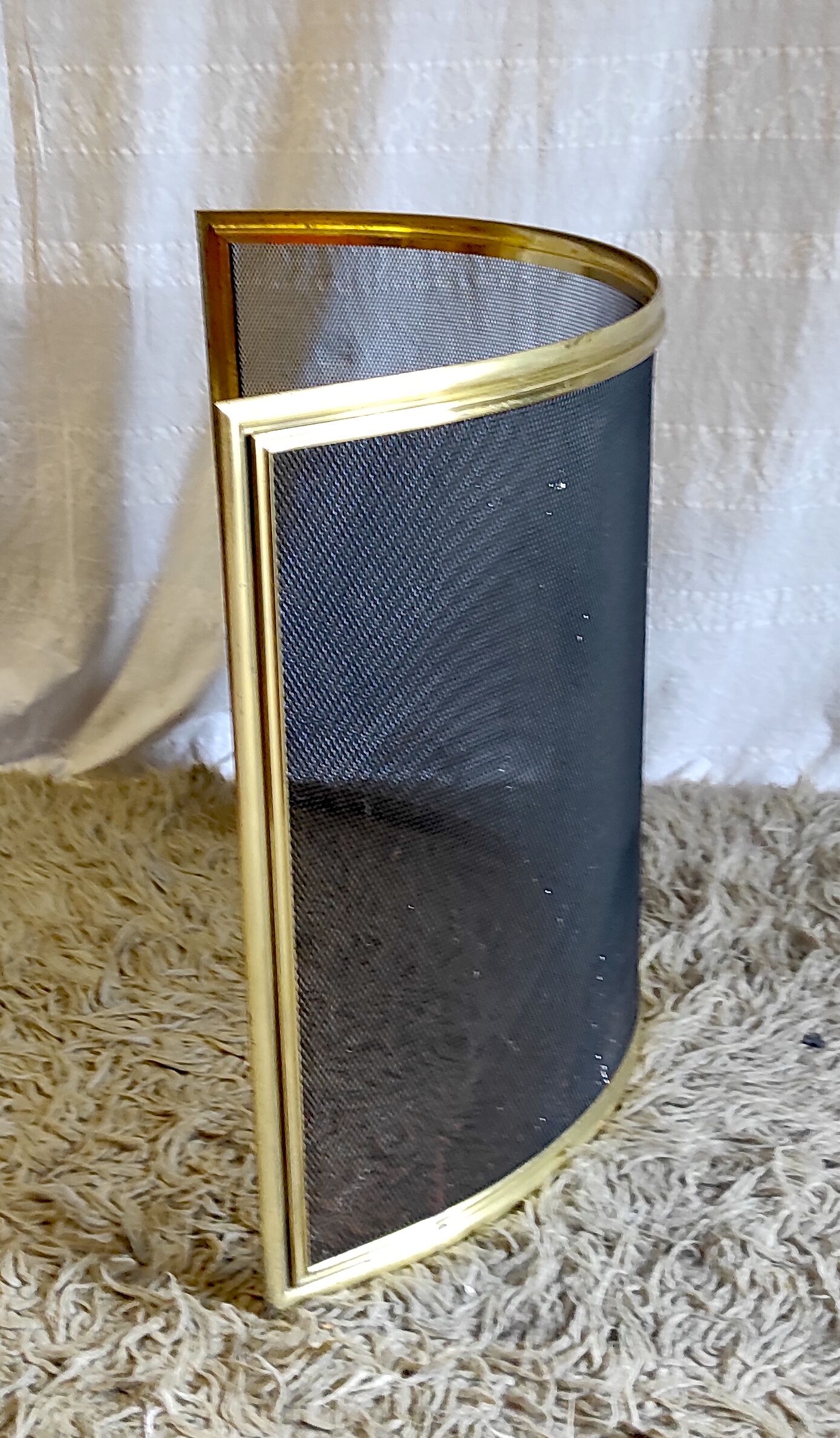 Brass bow firewall and metal mesh