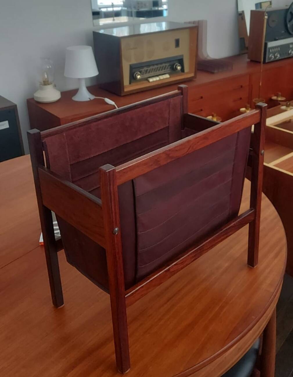 Scandinavian magazine rack/vinyl rack in Rio rosewood and leather by Torbjørn Afdal