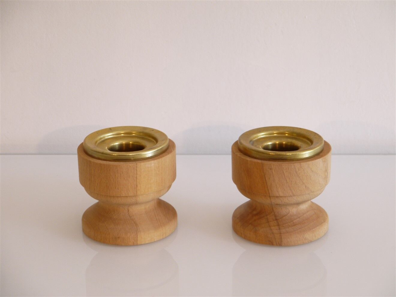 Pair of vintage candle holders in wood and brass