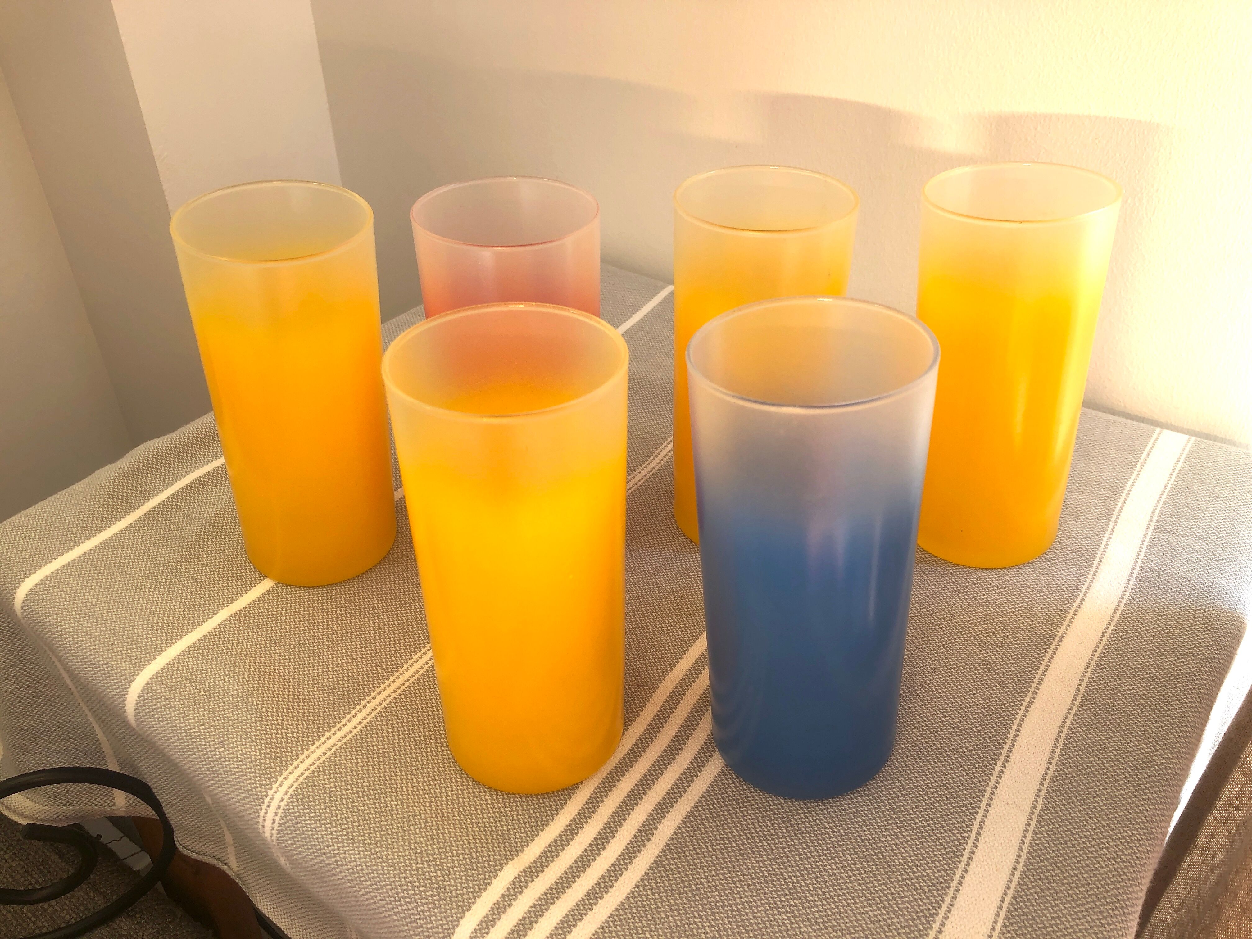 Yellow, red and frosted yellow orangeade glasses made of vintage glass