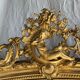 Large gilded mirror with acanthus leaf pediment H150 L98