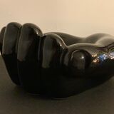 Black ceramic ashtray left hand