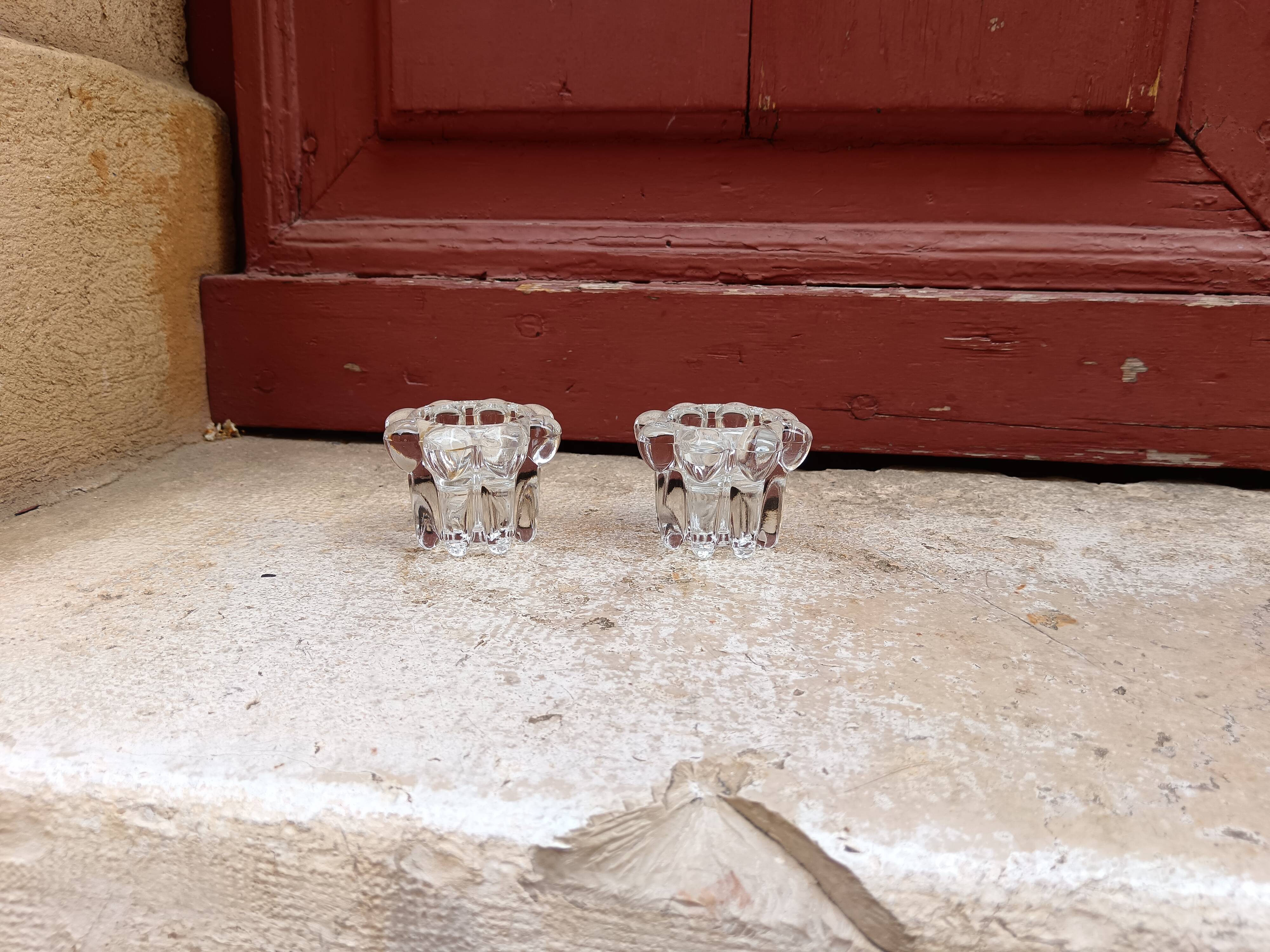 Pair of glass and crystal candlesticks in "bubble" style.