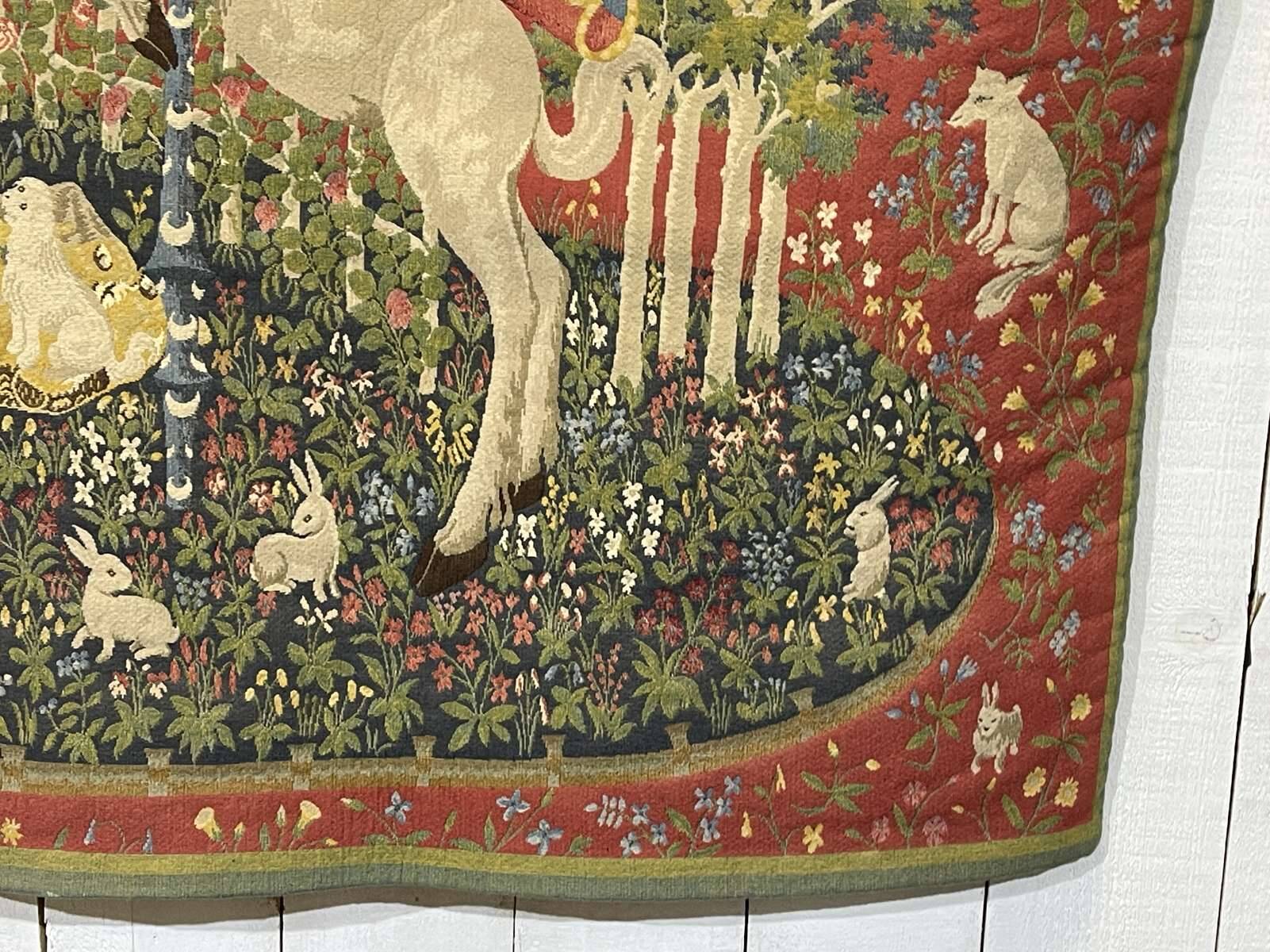 Medieval-style handmade tapestry, named Lady with the Unicorn.