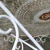 Ornate wrought iron garden table