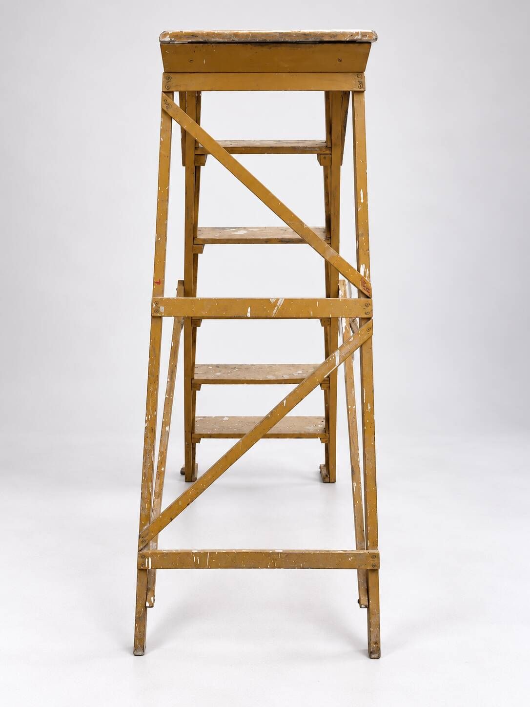 Vintage wooden painter's step ladder with a patina.