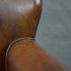 Cognac-colored subtle armchair