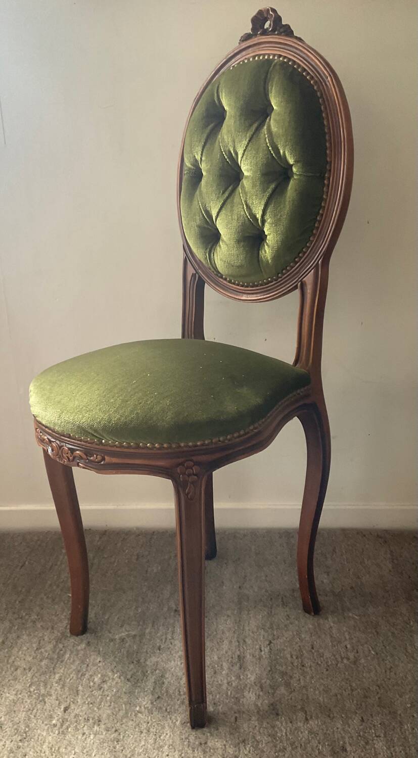 Antique wooden and velvet upholstered chair