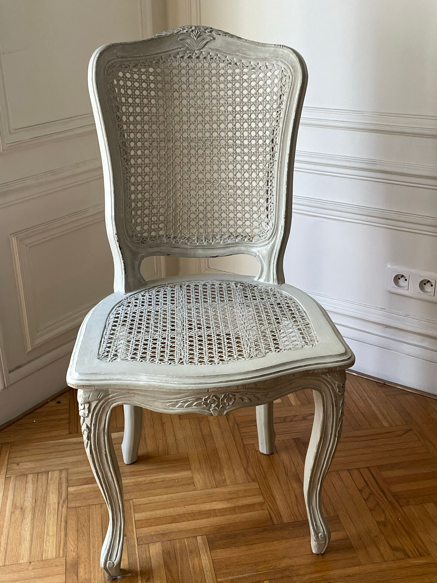 Set of 4 white caned chairs in Louis XV style.