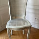 Set of 4 white caned chairs in Louis XV style.