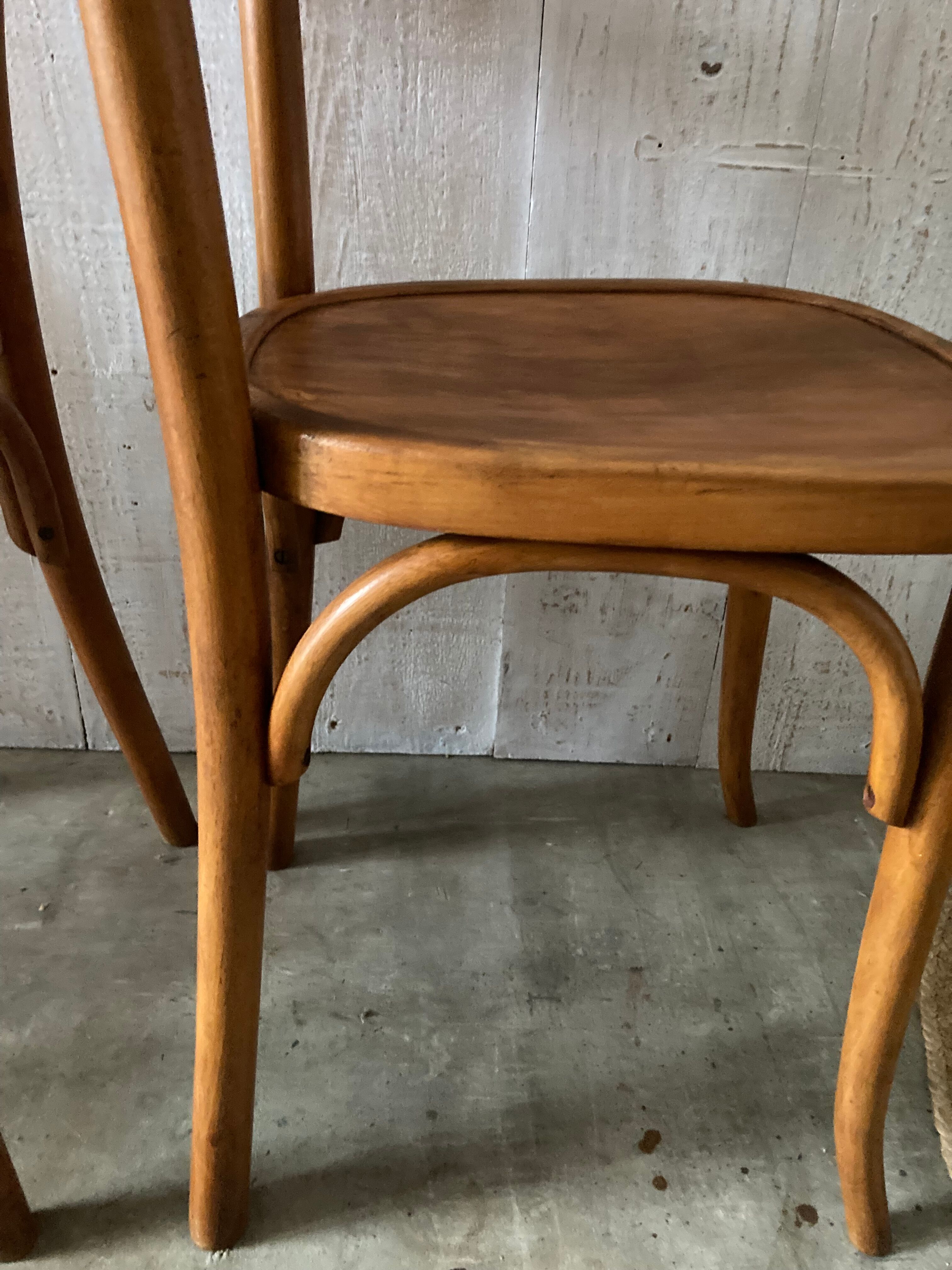 Pair of mismatched Thonet chairs