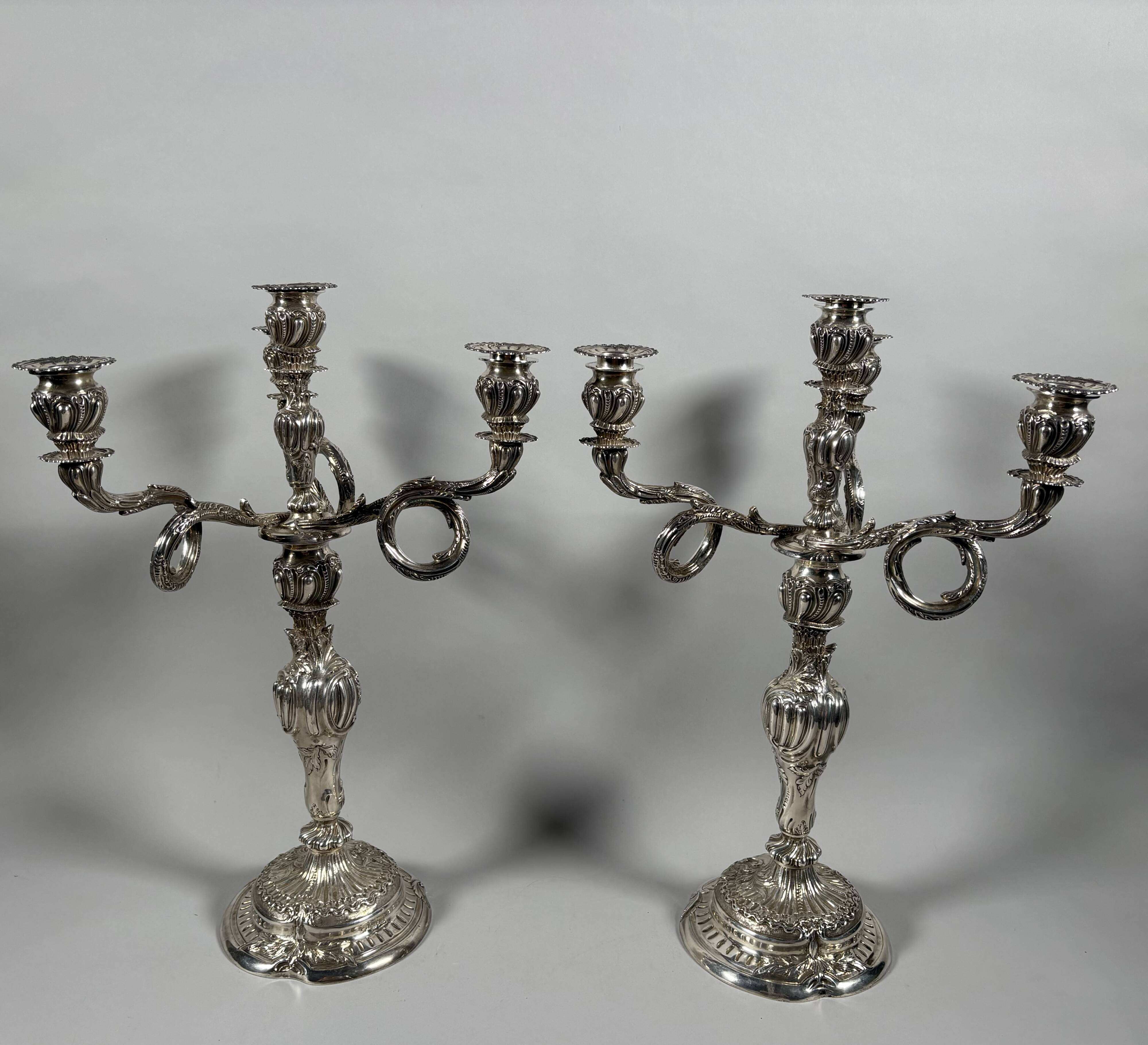 Pair of rocaille candelabra in solid 950 silver Louis XV style