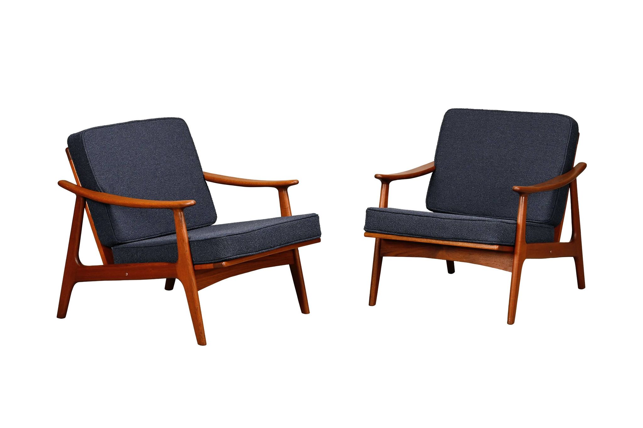 Pair Scandinavian Modern armchairs in teak and dark blue bouclé fabric
