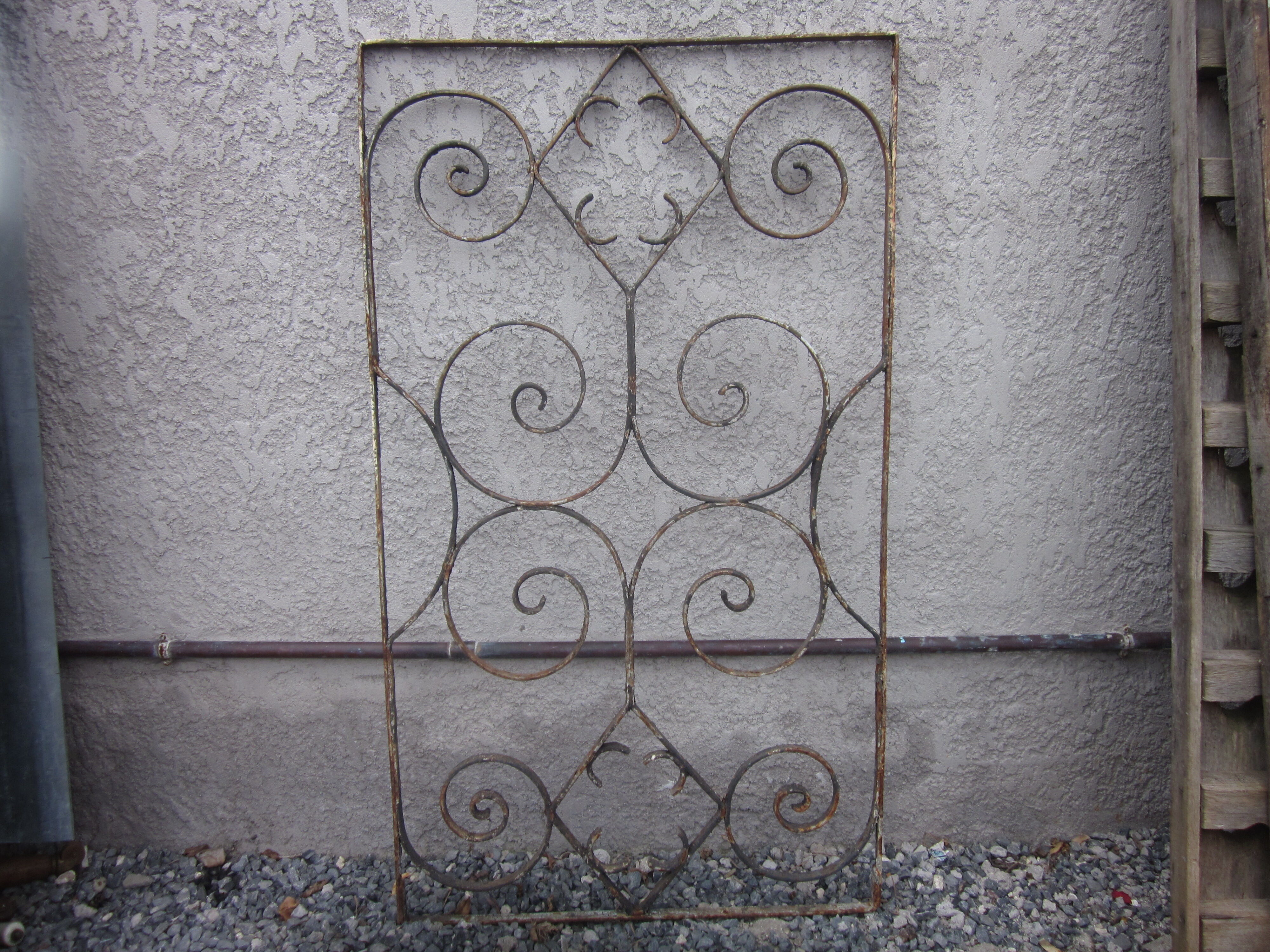 old wrought iron grid