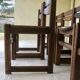 Set of 12 "sledge" dining chairs in walnut and cane.