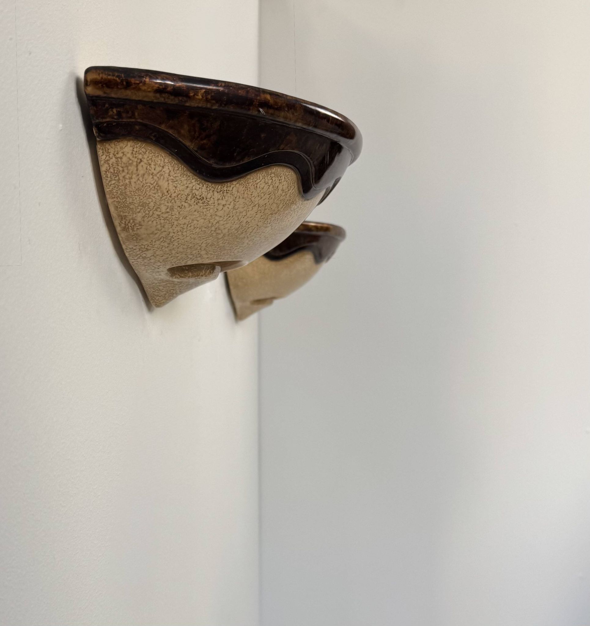 Pair of vintage wall sconces, beige and brown porcelain, France, 1960.
