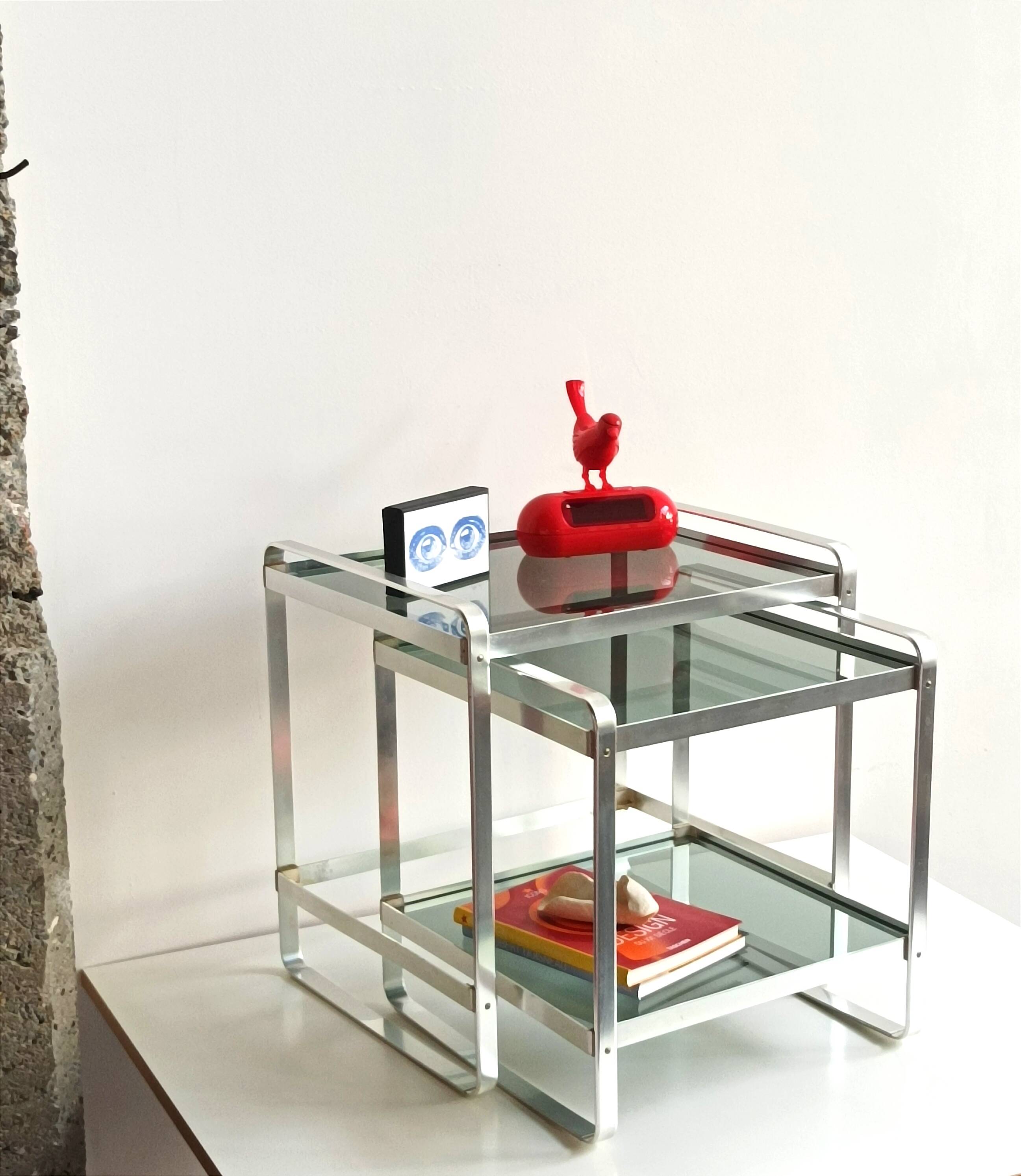 Nested tables in aluminium and smoked glass by Martini & Rossi, 1970s.