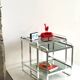 Nested tables in aluminium and smoked glass by Martini & Rossi, 1970s.