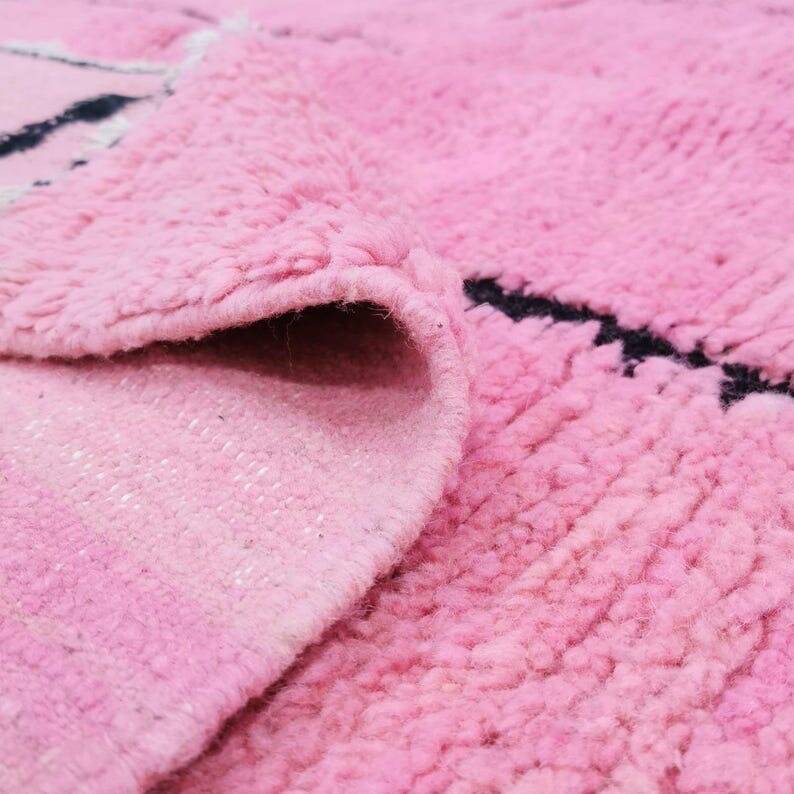 Traditional handwoven Berber rug in pink, size 150x250 cm.