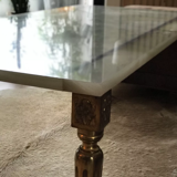 Coffee table in onyx and brass