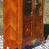 Glass library with rosewood marquetry in the Louis XV style.
