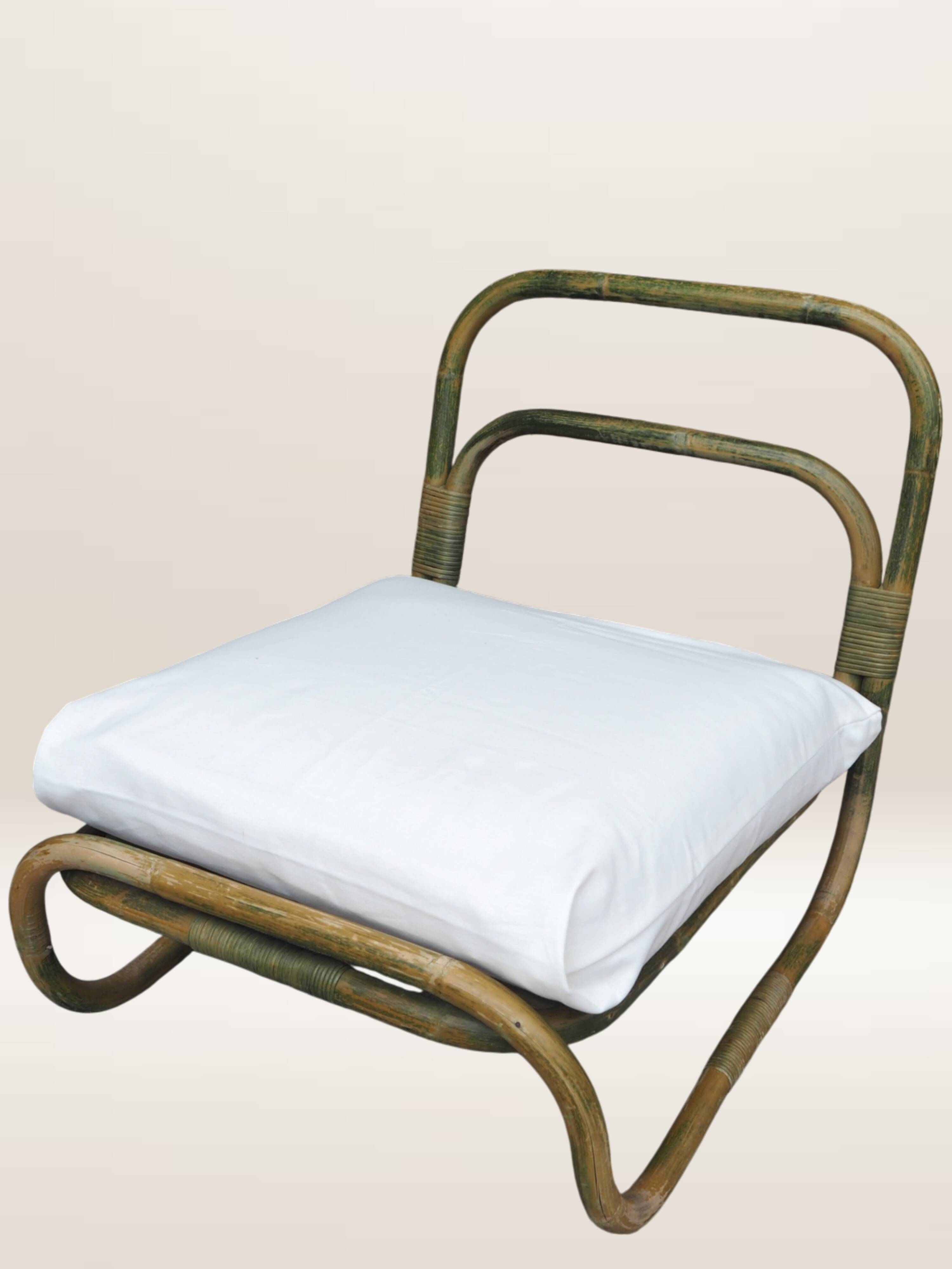 Pair of curved bamboo armchairs