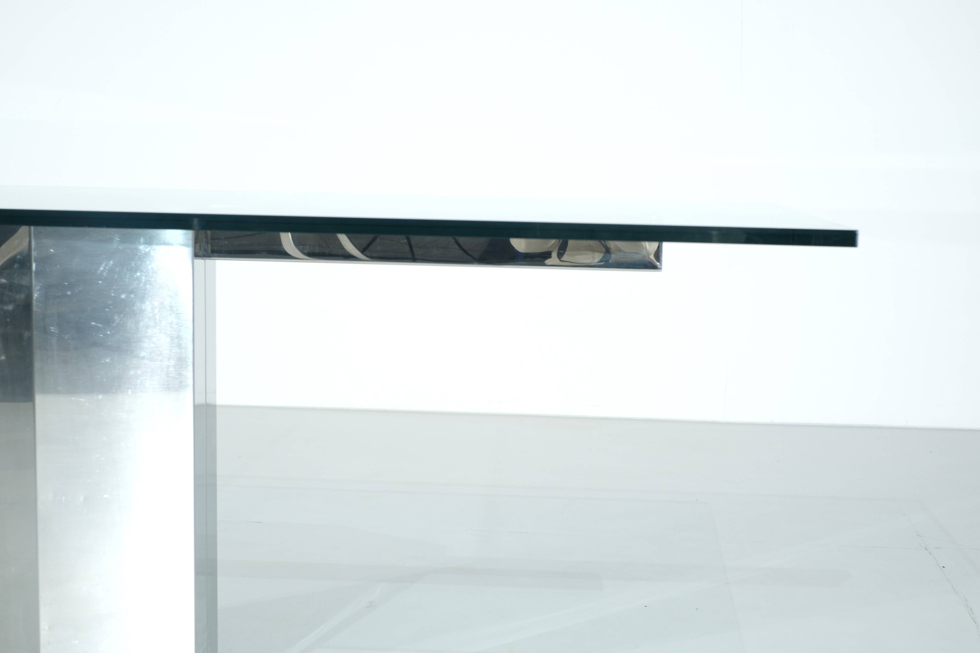 Glass table on chrome base, Italy - 1970s