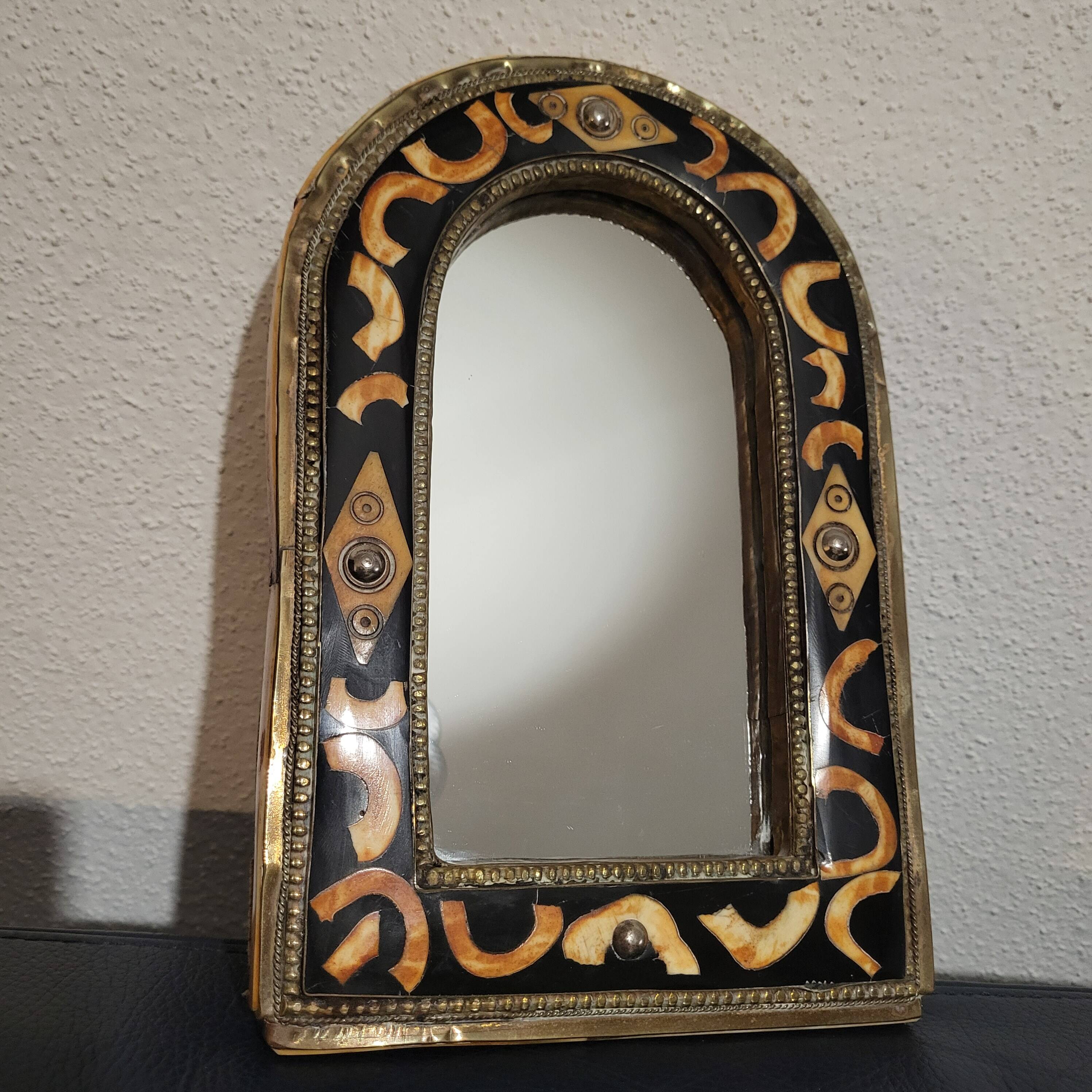 Oriental metal and bone mirror