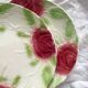 2 old slip plates decorated with roses