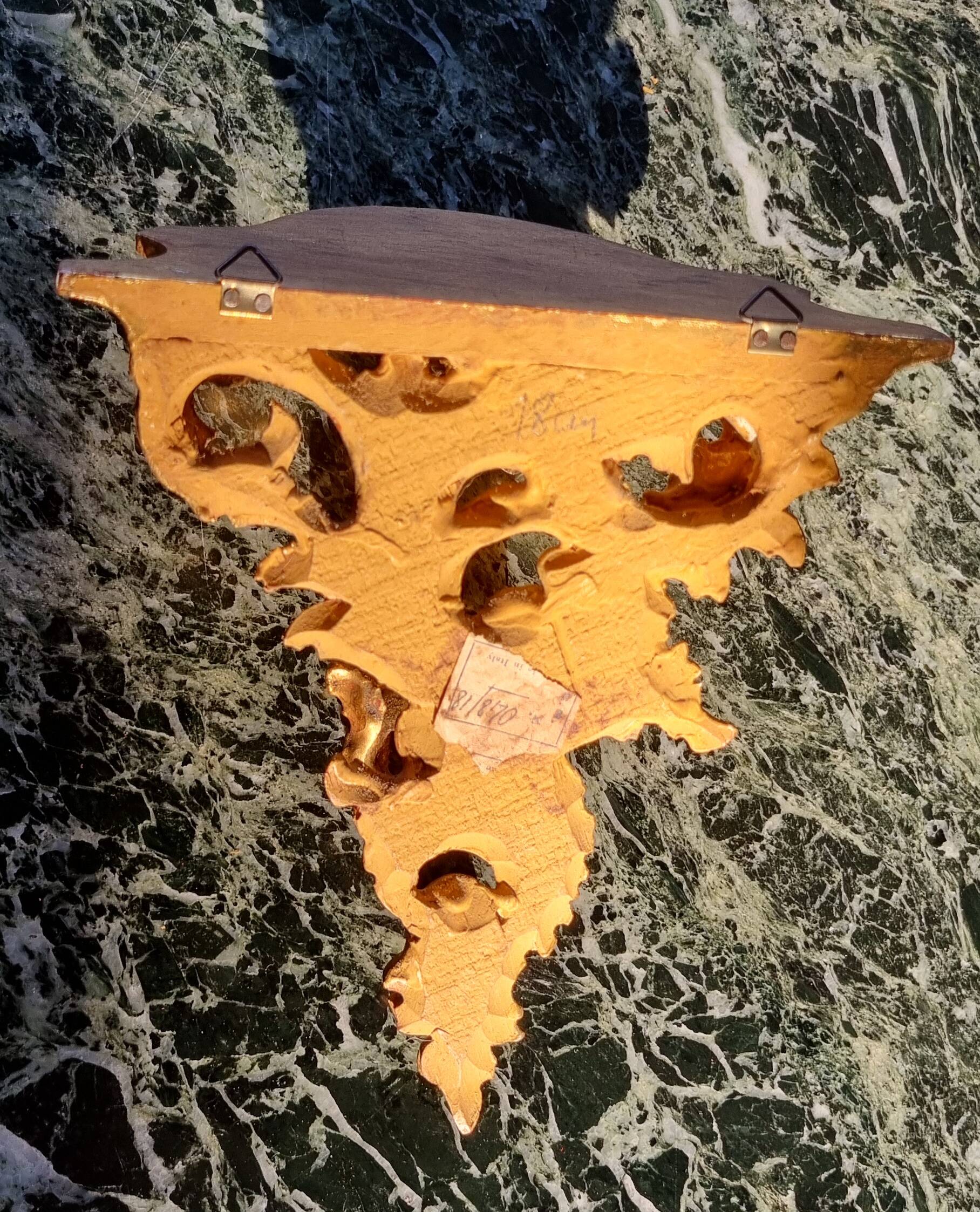 Golden wall shelf in Rococo style from the 1950s.